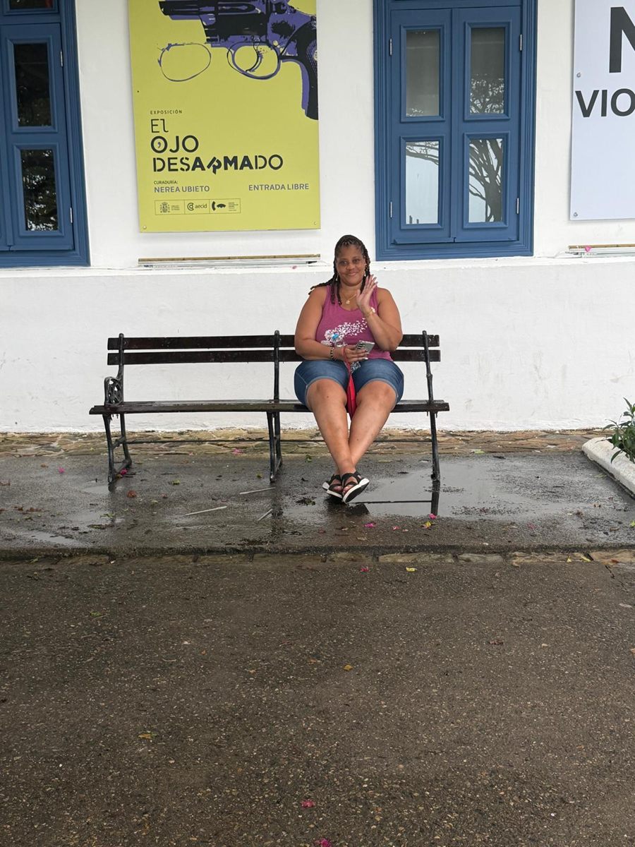 Member on a bench outside a Casco Viejo gallery