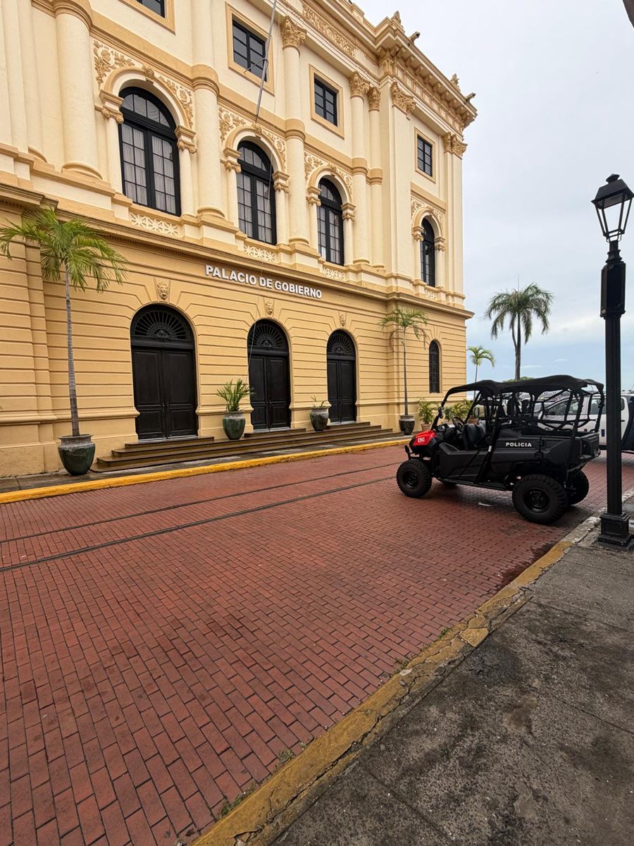The Palacio de Gobierno on a brick-paved street