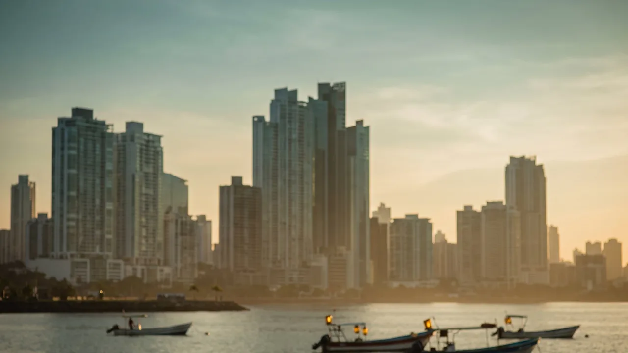 Panama City skyline — glass towers along the bay at dusk